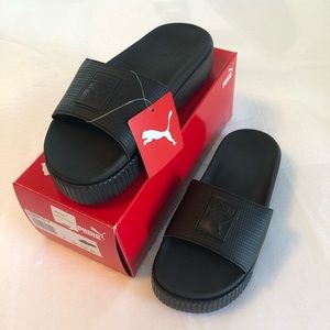 Puma platform slides
Never worn 
Clean
Smoke free
Original price was 50.00